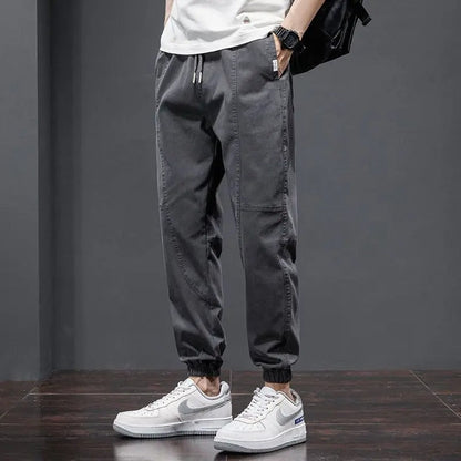 Versatile men's tapered joggers, cotton blend, relaxed fit for athletic workouts, casual outings & home comfort.