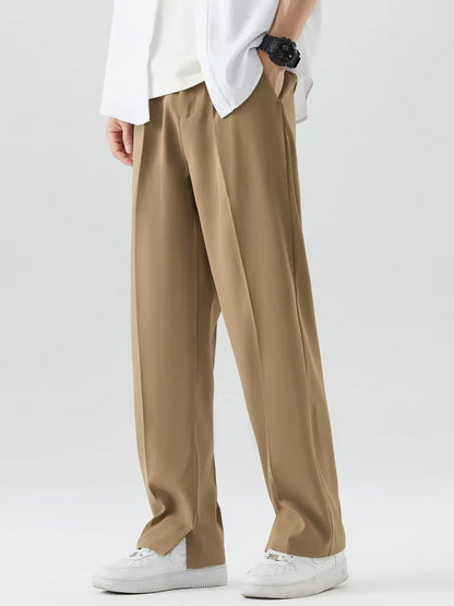 Comfortable men's relaxed fit tapered pants with an elastic waist for flexibility and daily wear.