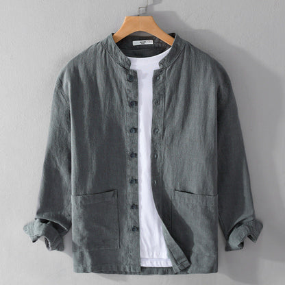 Men's relaxed fit textured long sleeve button-up shirt. Casual everyday wear with a stylish band collar.