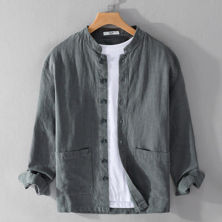 Men's relaxed fit textured long sleeve button-up shirt. Casual everyday wear with a stylish band collar.