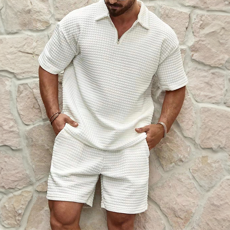 Men's relaxed fit waffle knit leisure set. Comfortable loungewear with zip-up top & matching pants.