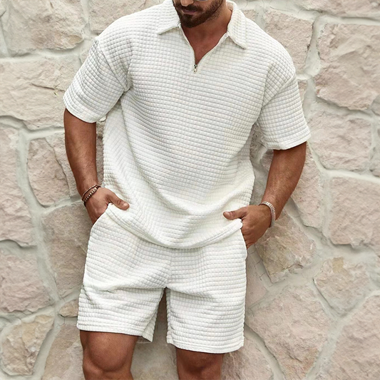 Men's relaxed fit waffle knit leisure set. Comfortable loungewear with zip-up top & matching pants.