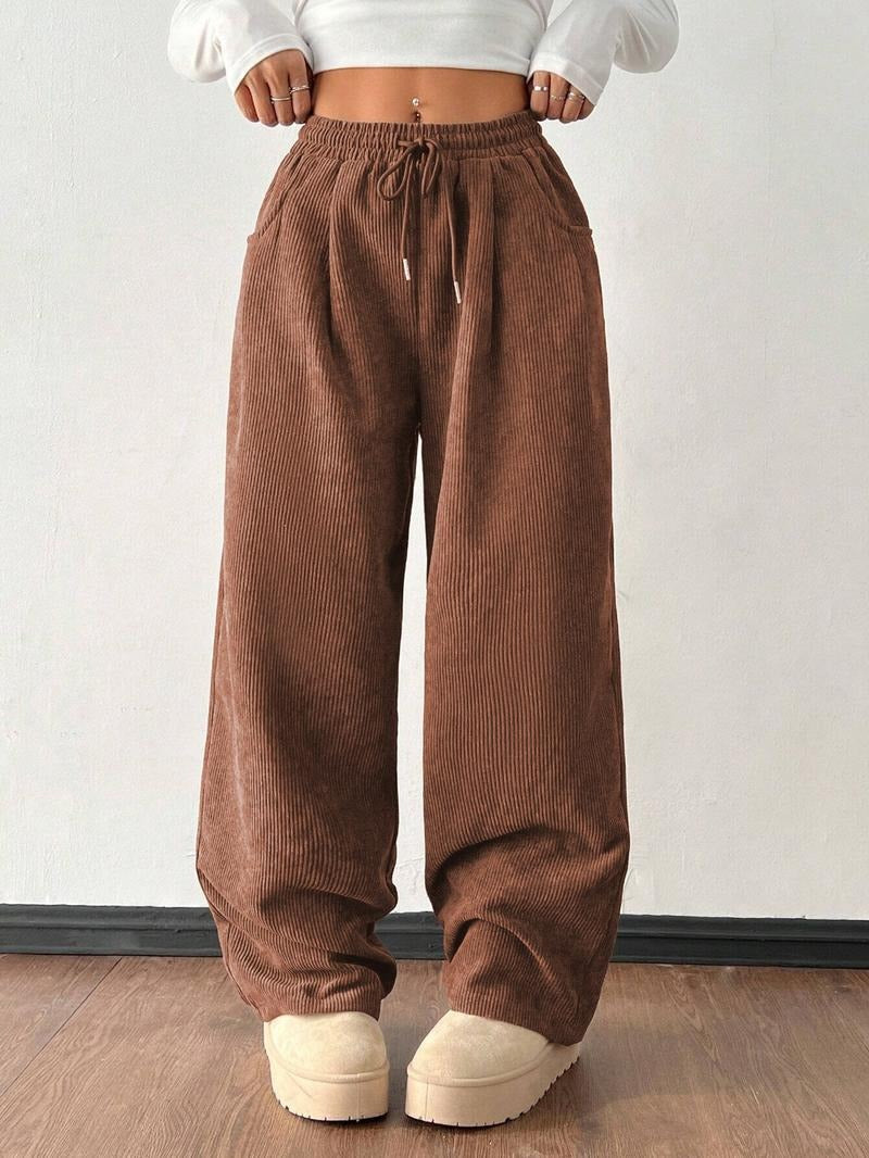 Men's relaxed fit wide-leg trousers, casual comfort pants with drawstring, versatile for men's fashion.