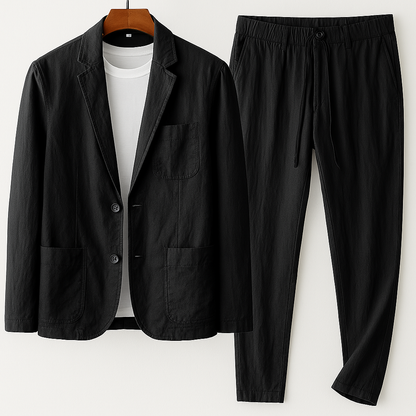 Effortless smart casual men's outfit: a relaxed blazer & drawstring pants. Ideal for versatile summer style.