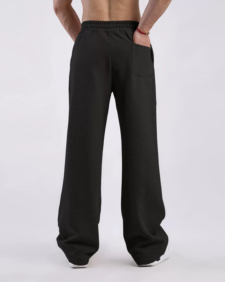 Modern comfort men's waffle knit sweatpants with soft touch fabric and straight leg design.