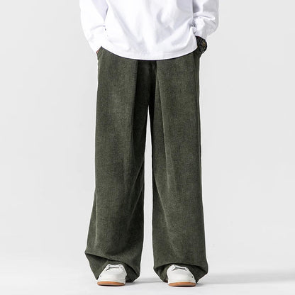 Vintage look men's wide-leg trousers, relaxed fit, drawstring waist, ideal for comfortable casual wear.