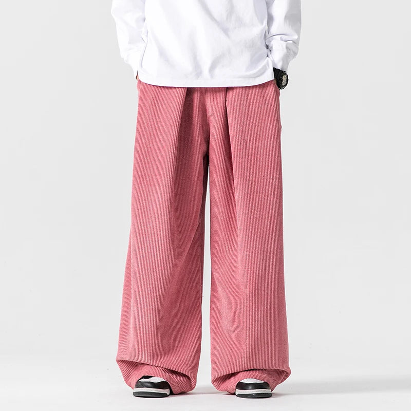 Effortless style men's relaxed wide-leg trousers, comfortable with a drawstring, great for casual occasions.