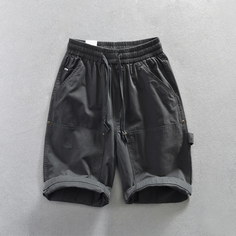 Men's Remo utility shorts, relaxed fit with deep pockets & adjustable waist, suitable for outdoor & active wear.