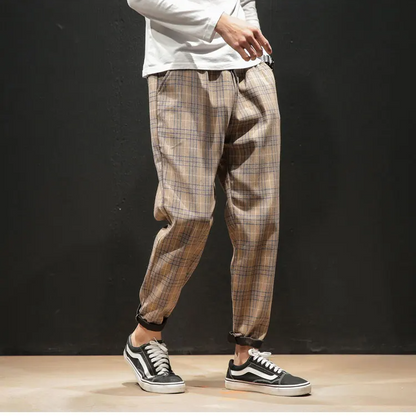 Easy care Men's Renegade Plaid Trousers, a convenient and stylish option for busy modern men.