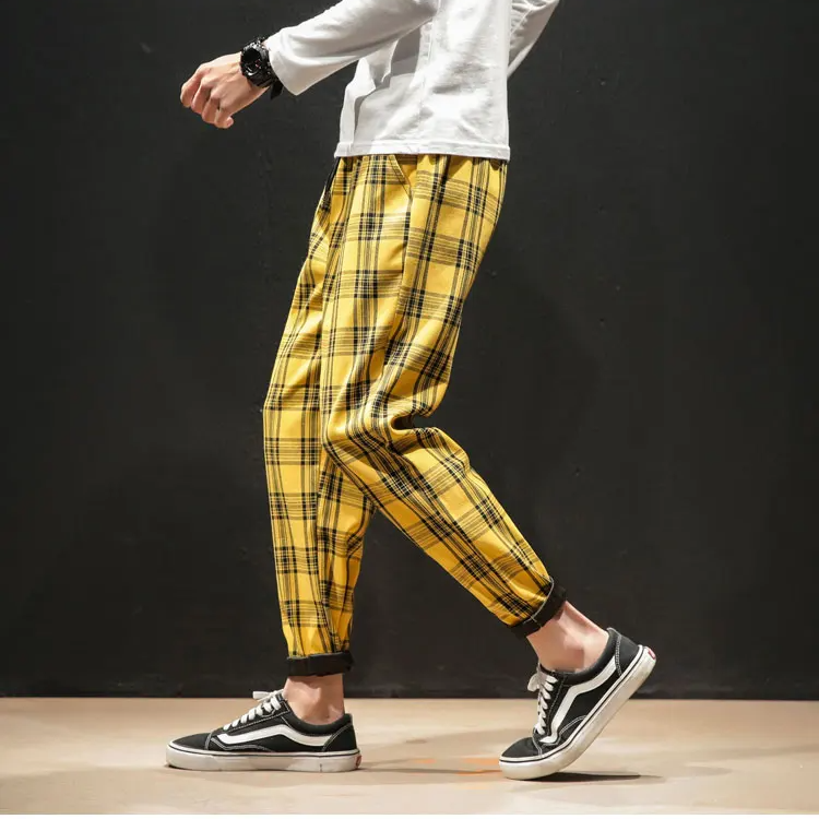 Tapered fit Men's Renegade Plaid Trousers, offering a sharp, modern silhouette for everyday wear.