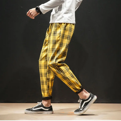 Tapered fit Men's Renegade Plaid Trousers, offering a sharp, modern silhouette for everyday wear.