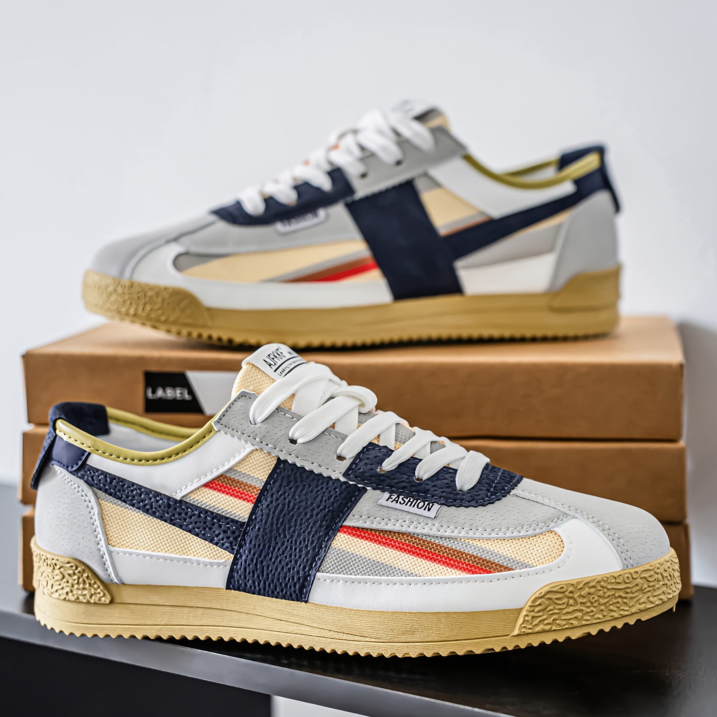 Vintage-inspired men's sneakers in striking colors, perfect for modern athletic & streetwear outfits.