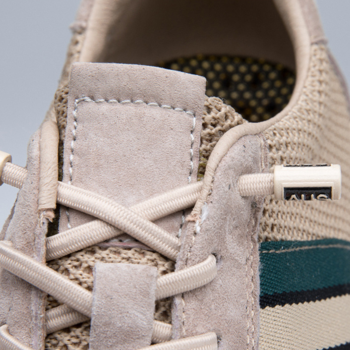 Pair of men's retro-inspired comfort sneakers, perfect casual lace-up footwear for everyday style.