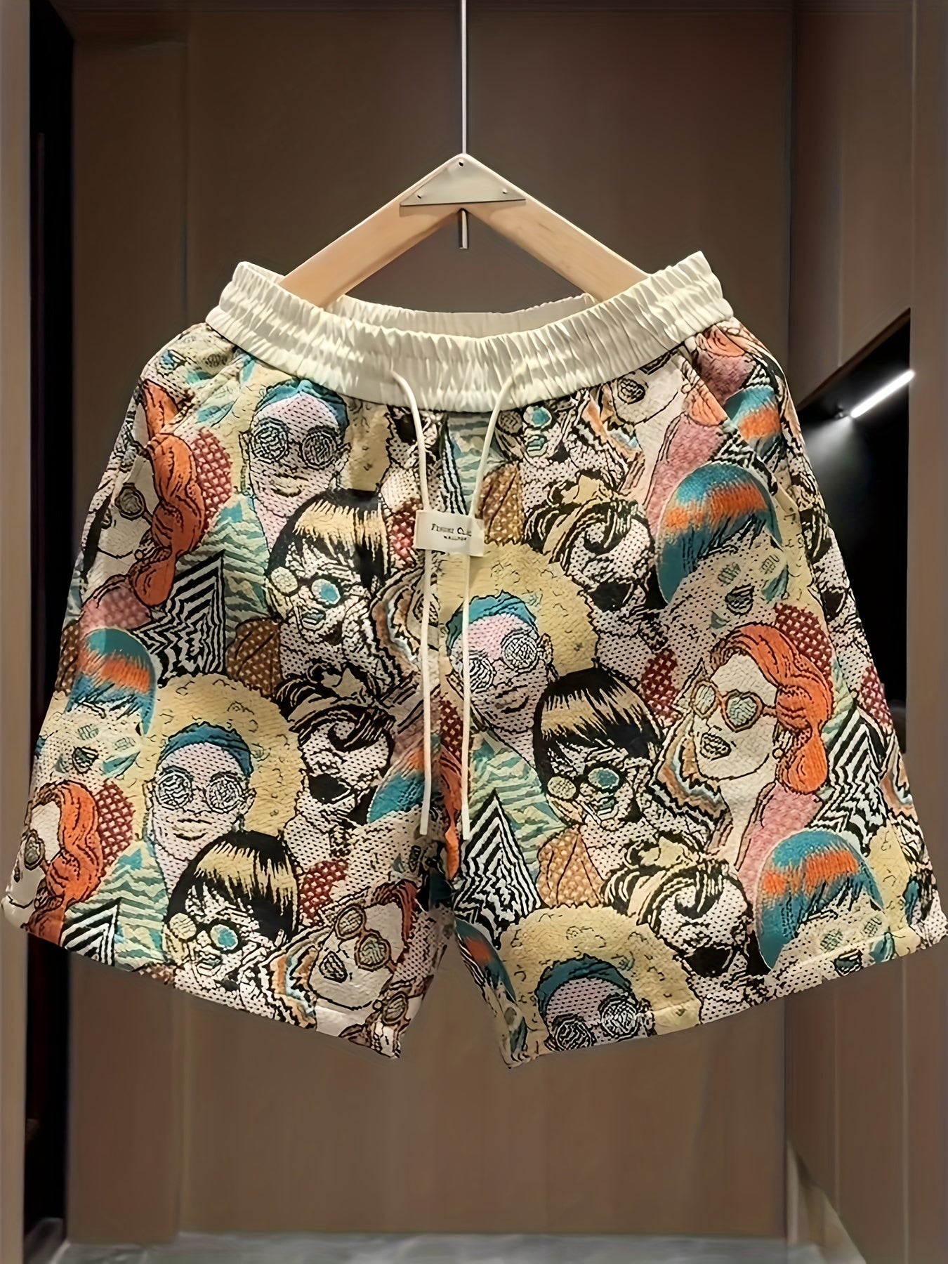 Men's retro pop art print shorts, vibrant graphic casual wear with drawstring, perfect for summer bold style.