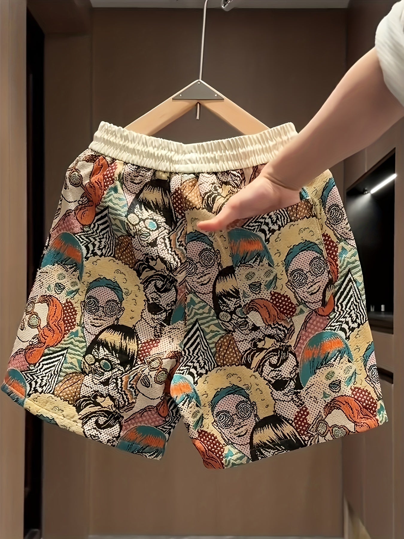Vibrant men's pop art graphic print shorts, unique retro style casual wear with a relaxed fit and drawstring.