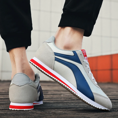 Stylish men's white and blue retro sneakers, lightweight for everyday wear.