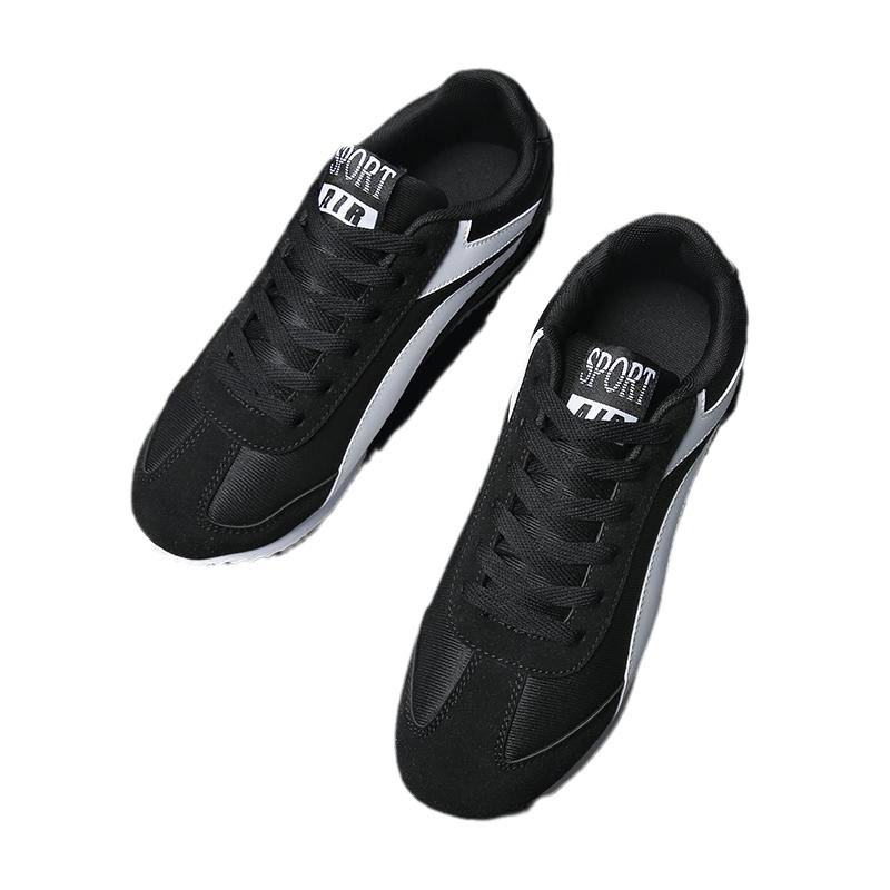 Timeless white & black retro men's sneakers, stylish everyday footwear.