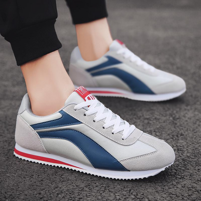 Timeless white and black retro sneakers for men, stylish and comfortable.