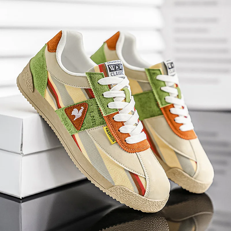 Men's retro track sneakers in colorful 80s style for dynamic urban streetwear.