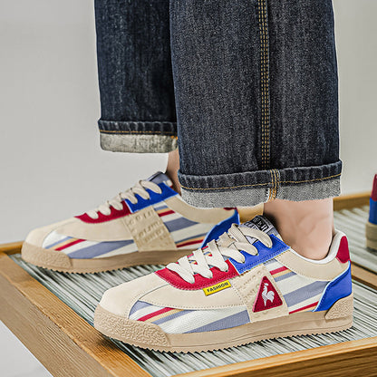 Men's 80s retro track sneakers, vibrant colors and low-cut design for modern street style.