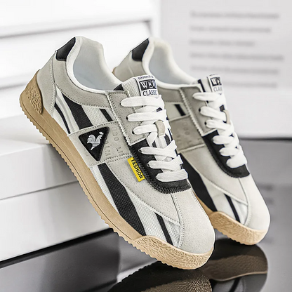 Dynamic men's streetwear sneakers, colorful retro 80s track design, low-cut urban footwear.