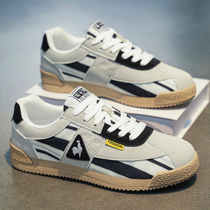 Dynamic men's athletic retro sneakers, low-cut 80s track design, comfortable streetwear.