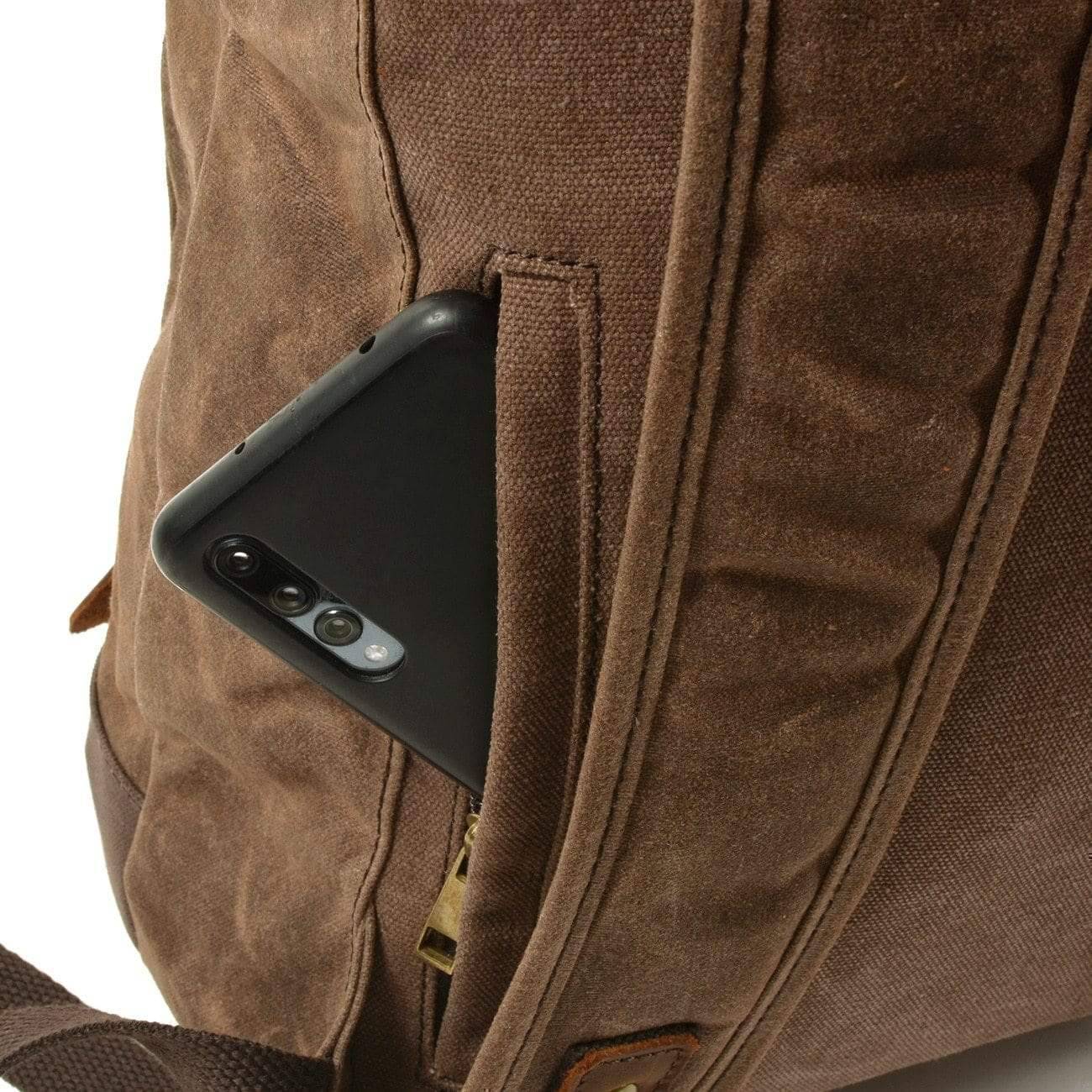 Men's rugged waterproof travel backpack, side view, perfect for survival gear