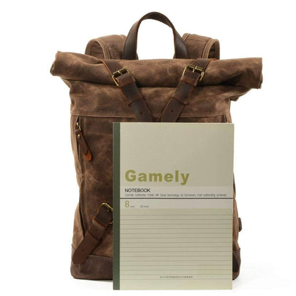 Vintage style men's waterproof hiking backpack showing adjustable shoulder straps