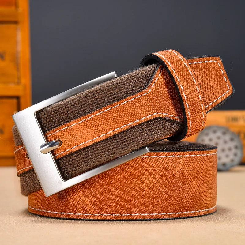 Durable men's reversible belt featuring strong denim and canvas materials for long-lasting wear.