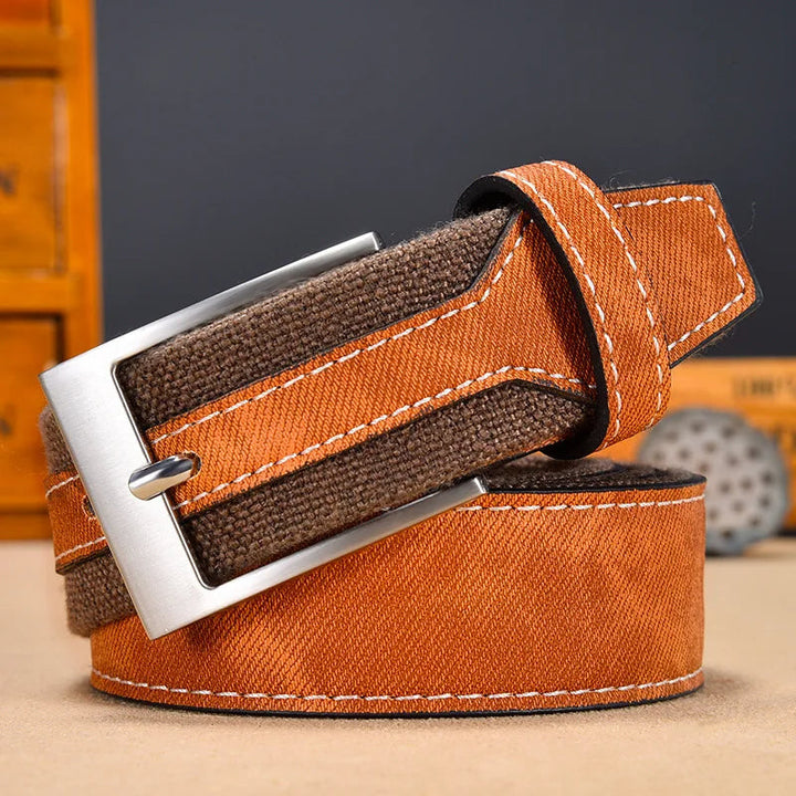 Durable men's reversible belt featuring strong denim and canvas materials for long-lasting wear.