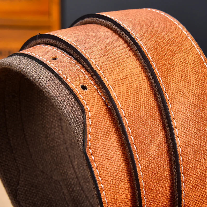 Men's reversible denim belt styled with casual trousers, showcasing its versatility and modern appeal.