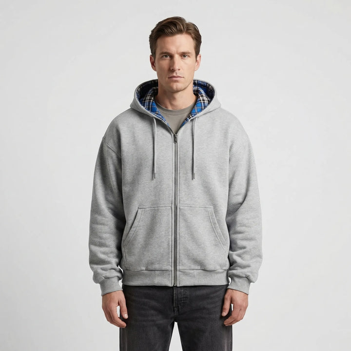 Man wearing a stylish Josh reversible oversized hoodie, demonstrating its relaxed streetwear fit and modern fashion.