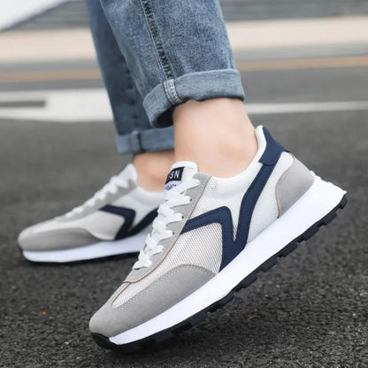 Man wearing Revive athletic sneakers, offering ultimate comfort and support for active workouts.