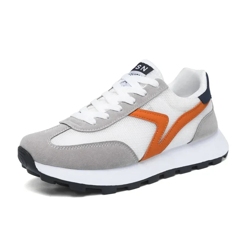 Close-up of men's Revive athletic shoe sole, highlighting the ultimate comfort cushioning and durable grip.