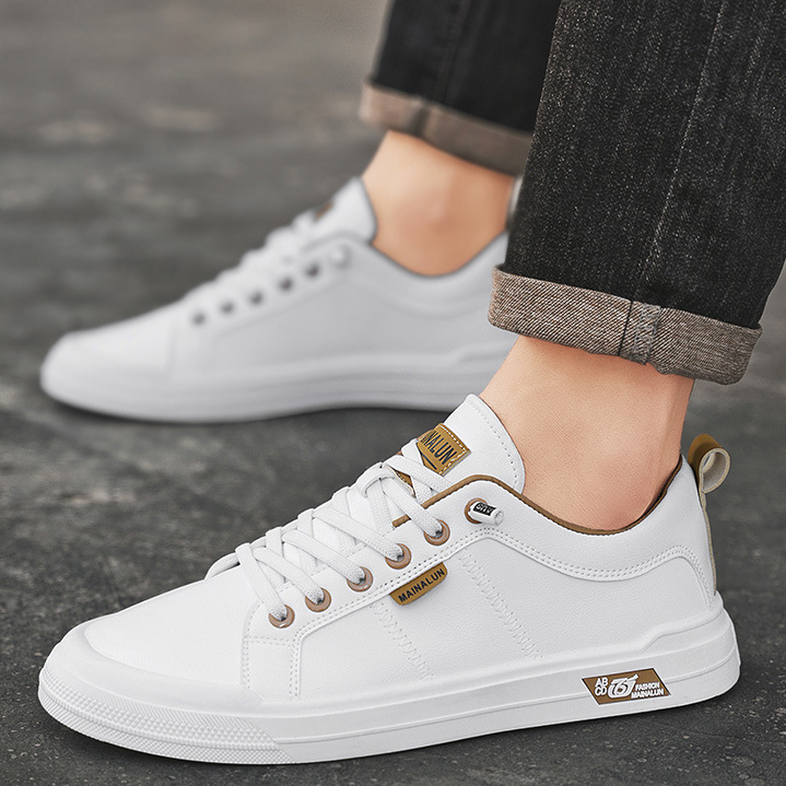 Stylish men's Rhodes black low-top sneakers. Classic casual footwear for everyday fashion & superior comfort.