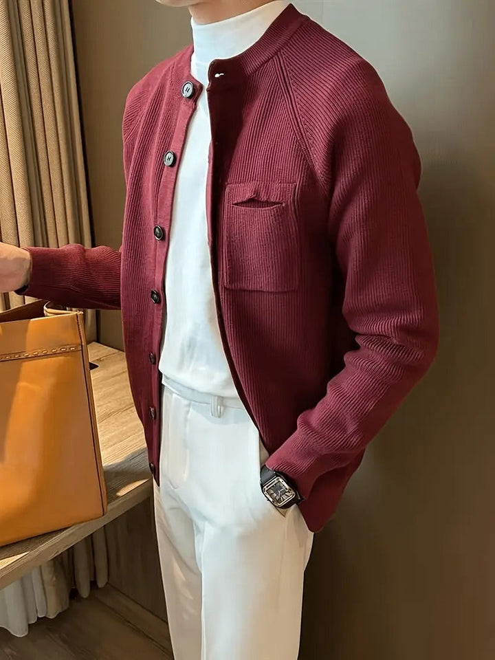 Fashionable men's outerwear: a ribbed button-front cardigan sweater, ideal for year-round style.