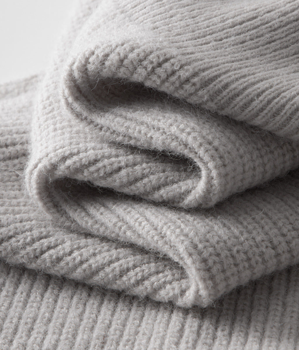 Detail-rich ribbed men's zip cardigan with funnel neck, excellent for fashionable layering.