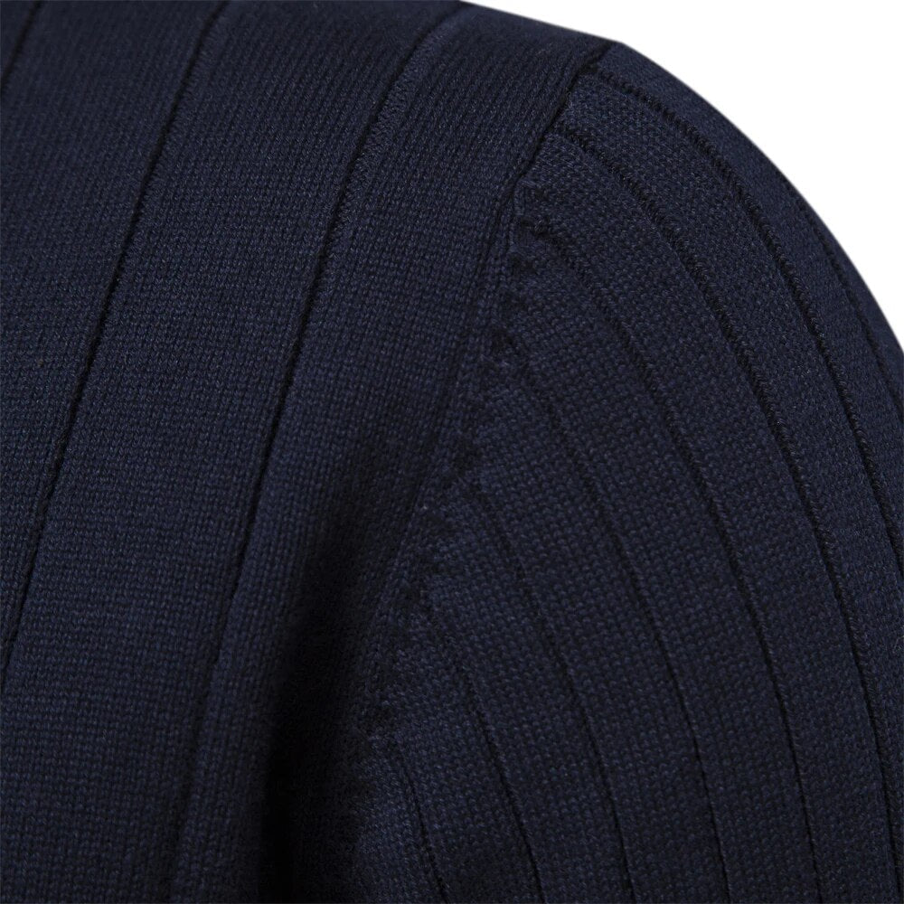 Comfortable long-sleeve men's ribbed sweater with a half-zip neckline, great for everyday winter wear.