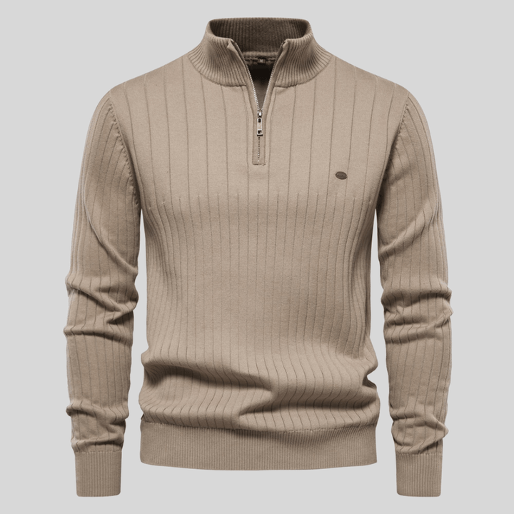 Elegant men's smart casual half-zip sweater, a wardrobe essential for sophisticated layered winter outfits.