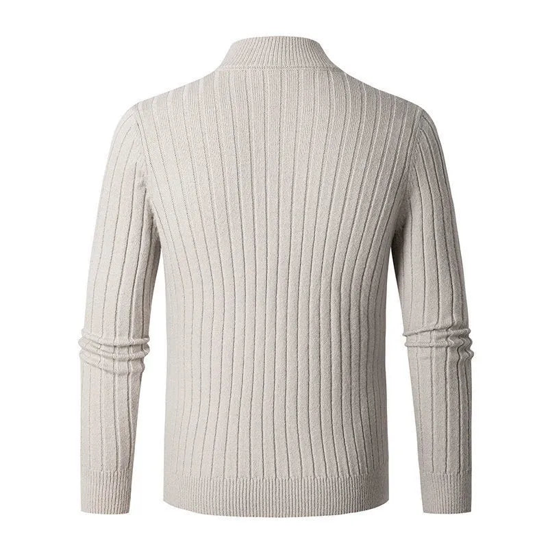 Stylish man wearing a ribbed half-zip sweater, perfect for casual comfort or sophisticated layering.