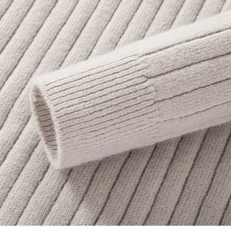 Versatile men's ribbed half-zip sweater in a neutral shade, modern style for ultimate comfort.