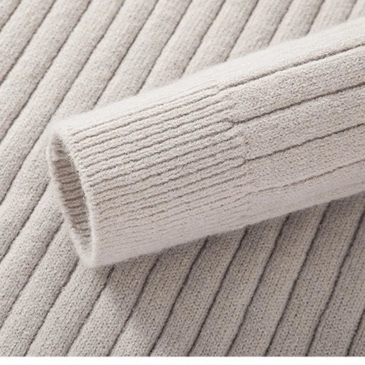 Versatile men's ribbed half-zip sweater in a neutral shade, modern style for ultimate comfort.