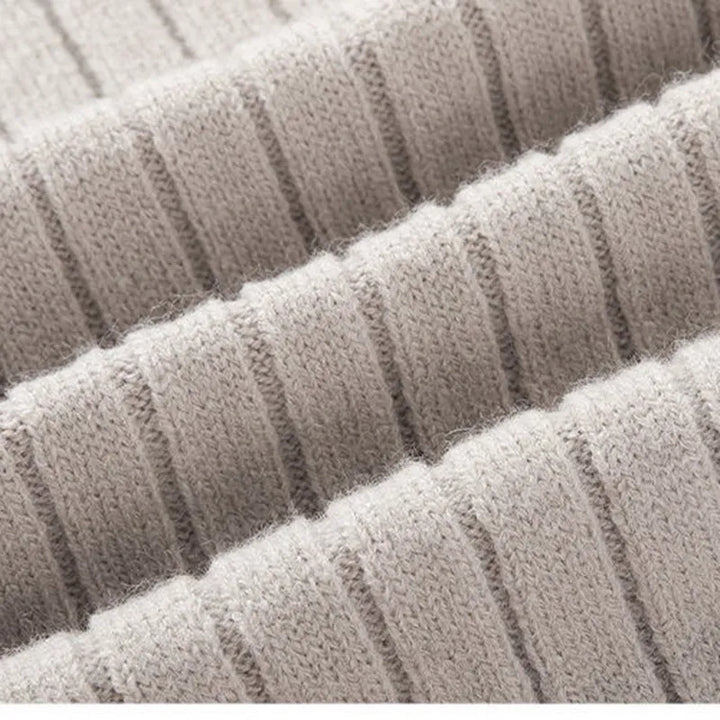 Textured men's ribbed half-zip sweater. Modern design combines style, comfort & casual sophistication.