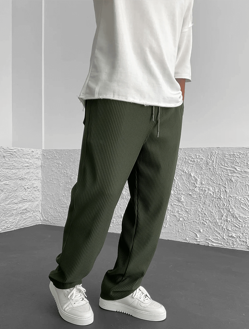 Comfortable men's ribbed jogger pants, ideal for casual wear & lounging. Modern bottom.