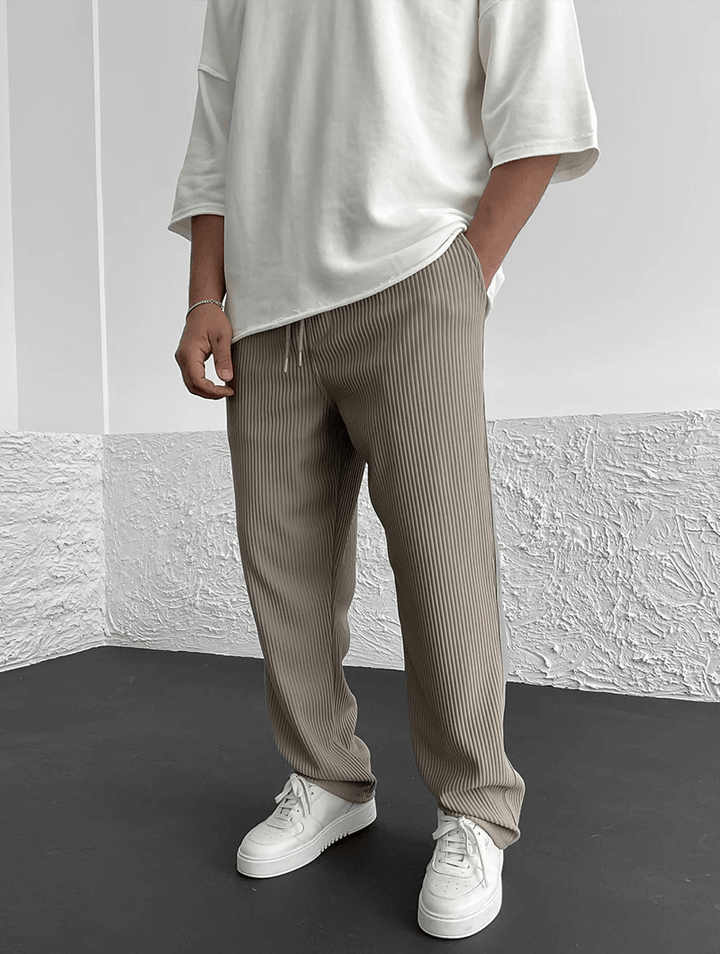 Comfortable & stylish men's ribbed jogger pants for a modern, relaxed fit look.