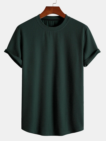 Black men's ribbed muscle fit t-shirt, fitted design for an athletic & modern look.