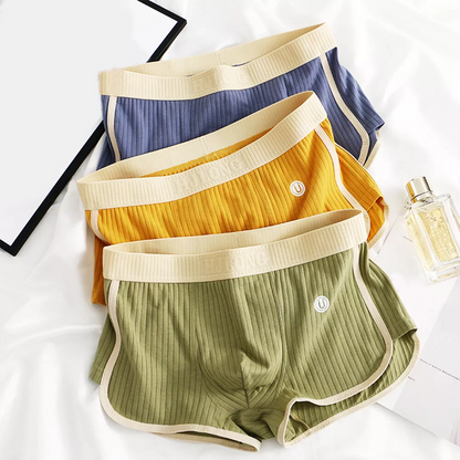 Close-up of ribbed performance briefs fabric, highlighting breathable, stretchy, and soft texture.