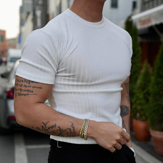 Men's ribbed performance t-shirt with dynamic fit. Slim, comfortable athletic top for everyday wear.