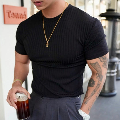 Black men's slim fit ribbed performance t-shirt. Basic crew neck athletic top for dynamic everyday wear.
