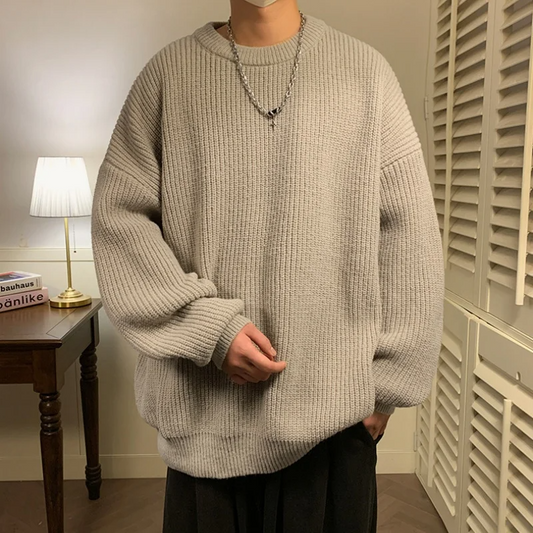 Men's ribbed pullover sweater with a relaxed fit, perfect for casual modern style and comfort.